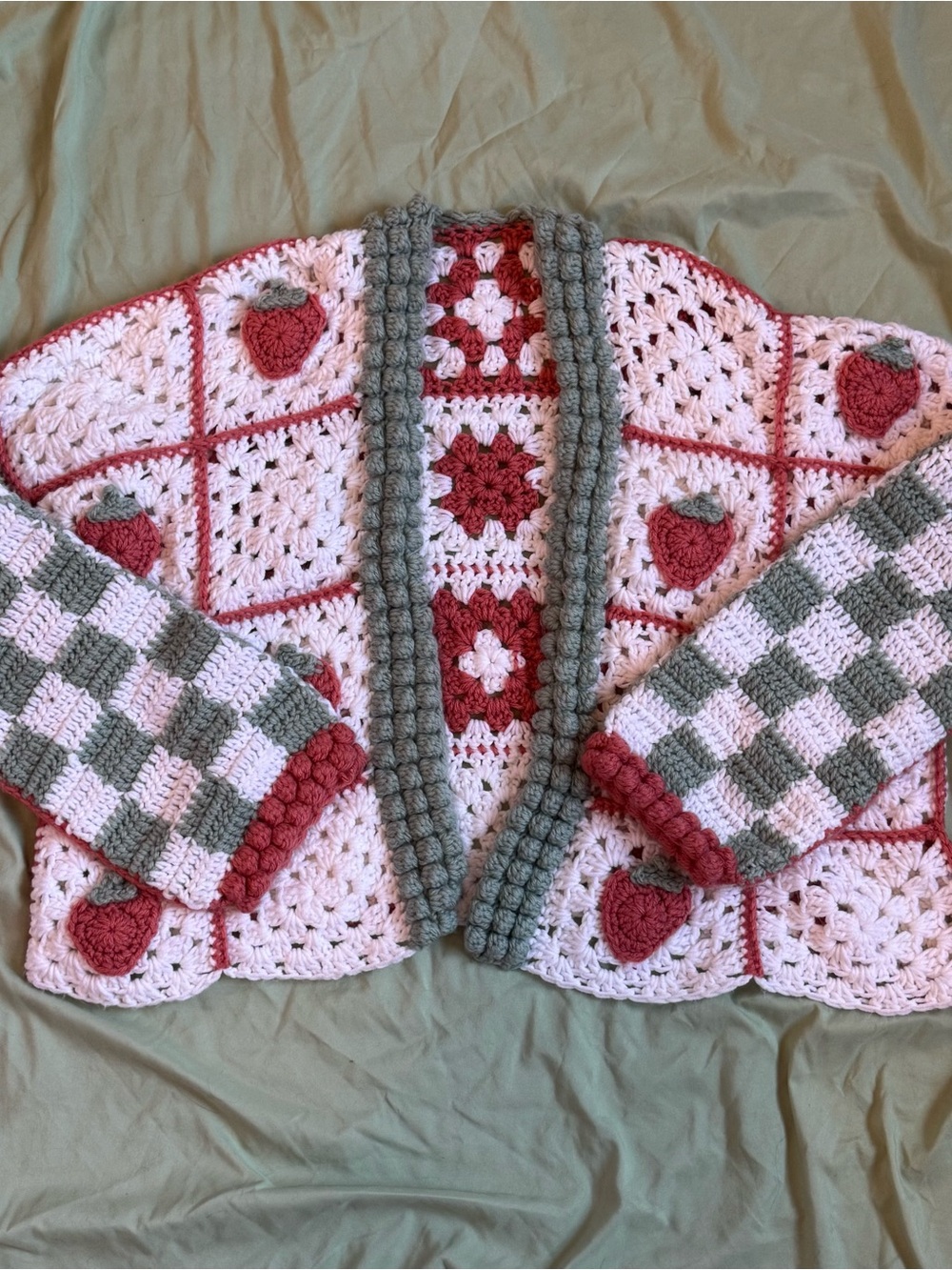Handmade crochet strawberry cardigan!